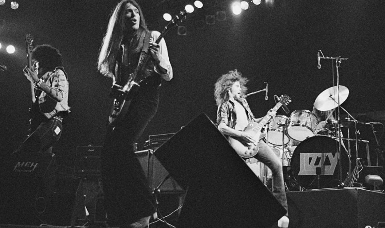 Thin Lizzy perfrom on stage at Cardiff Castle, Wales, United Kingdom, 1975. L-R Phil Lynott, Scott Gorham, Brian Robertson, Broan Downey. 