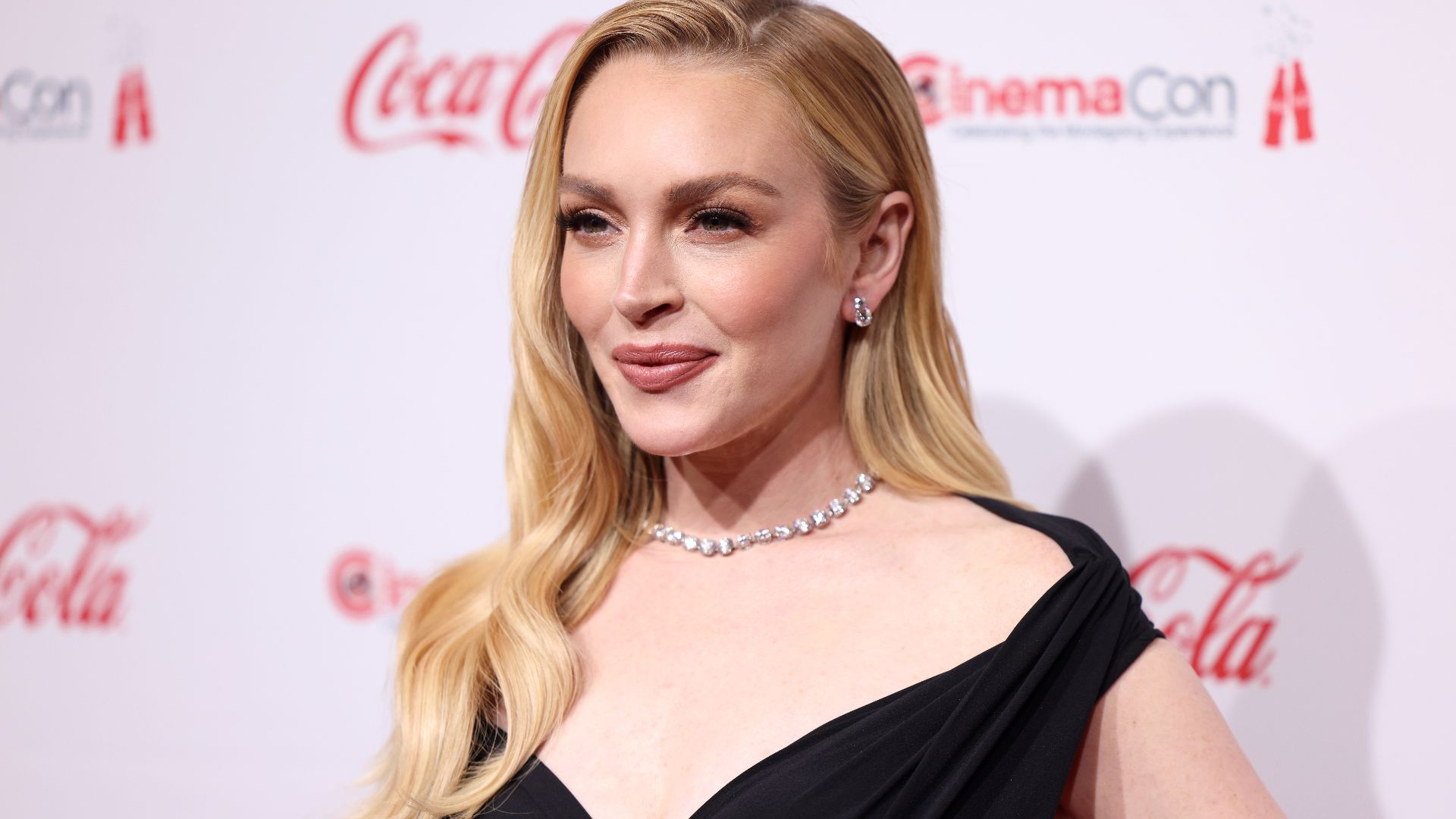 Lindsay Lohan on the red carpet at the Big Screen Achievement Awards at the 2025 CinemaCon at The Colosseum Theater at Caesars Palace in Las Vegas, Nevada.

Please attribute to Gage Skidmore if used elsewhere.