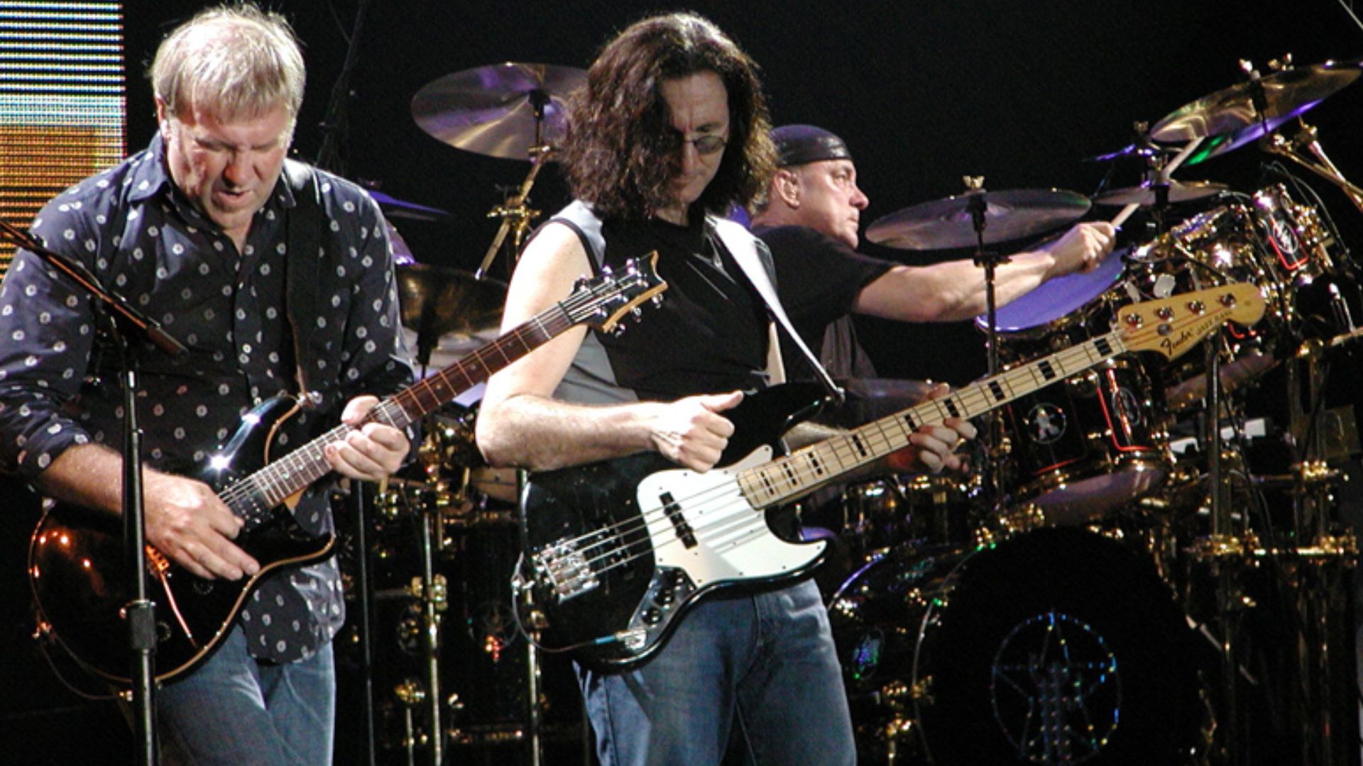 File:Rush-in-concert.jpg