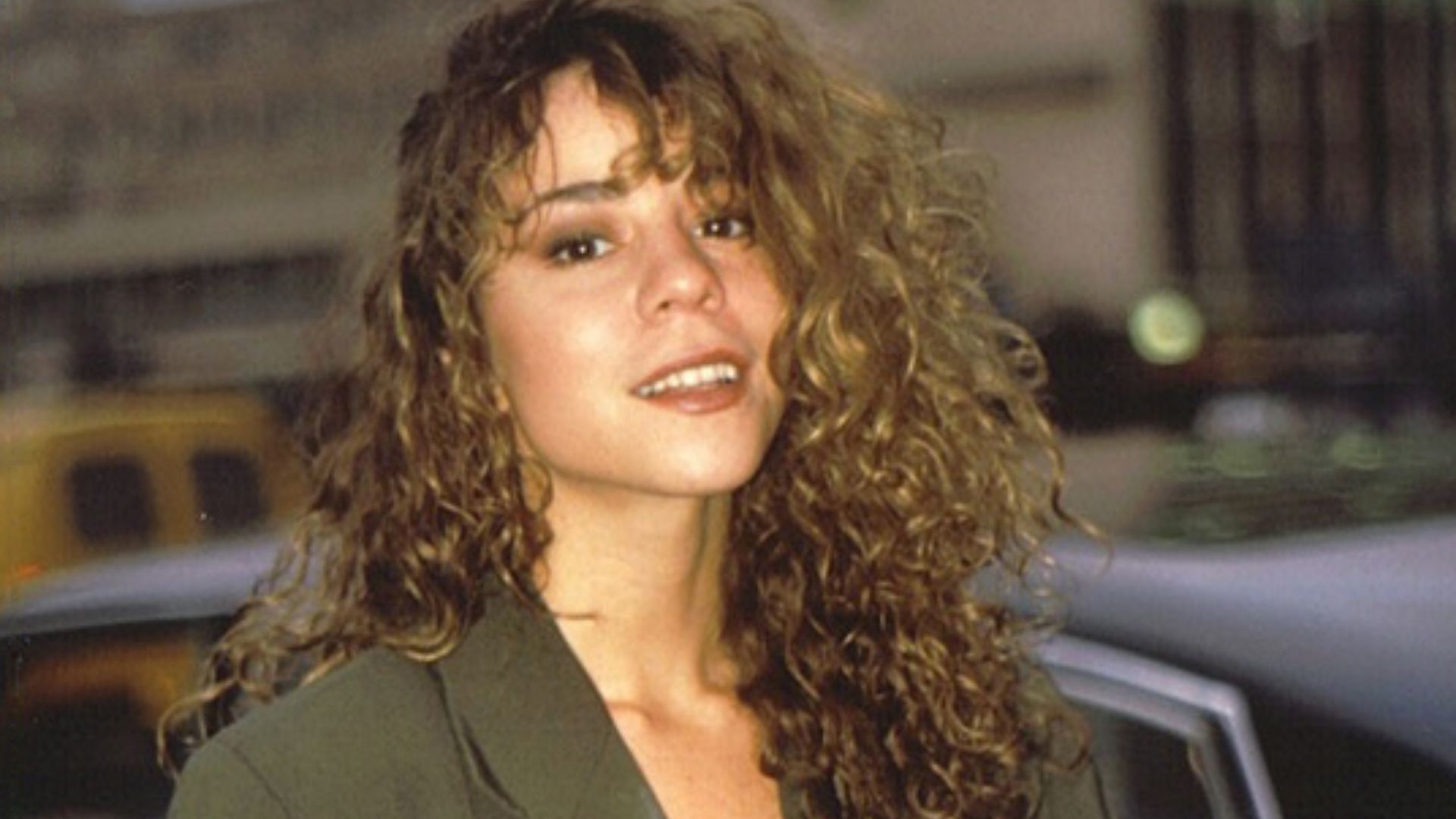 Mariah Carey exiting the Shepherd's Bush Theatre after promoting her single