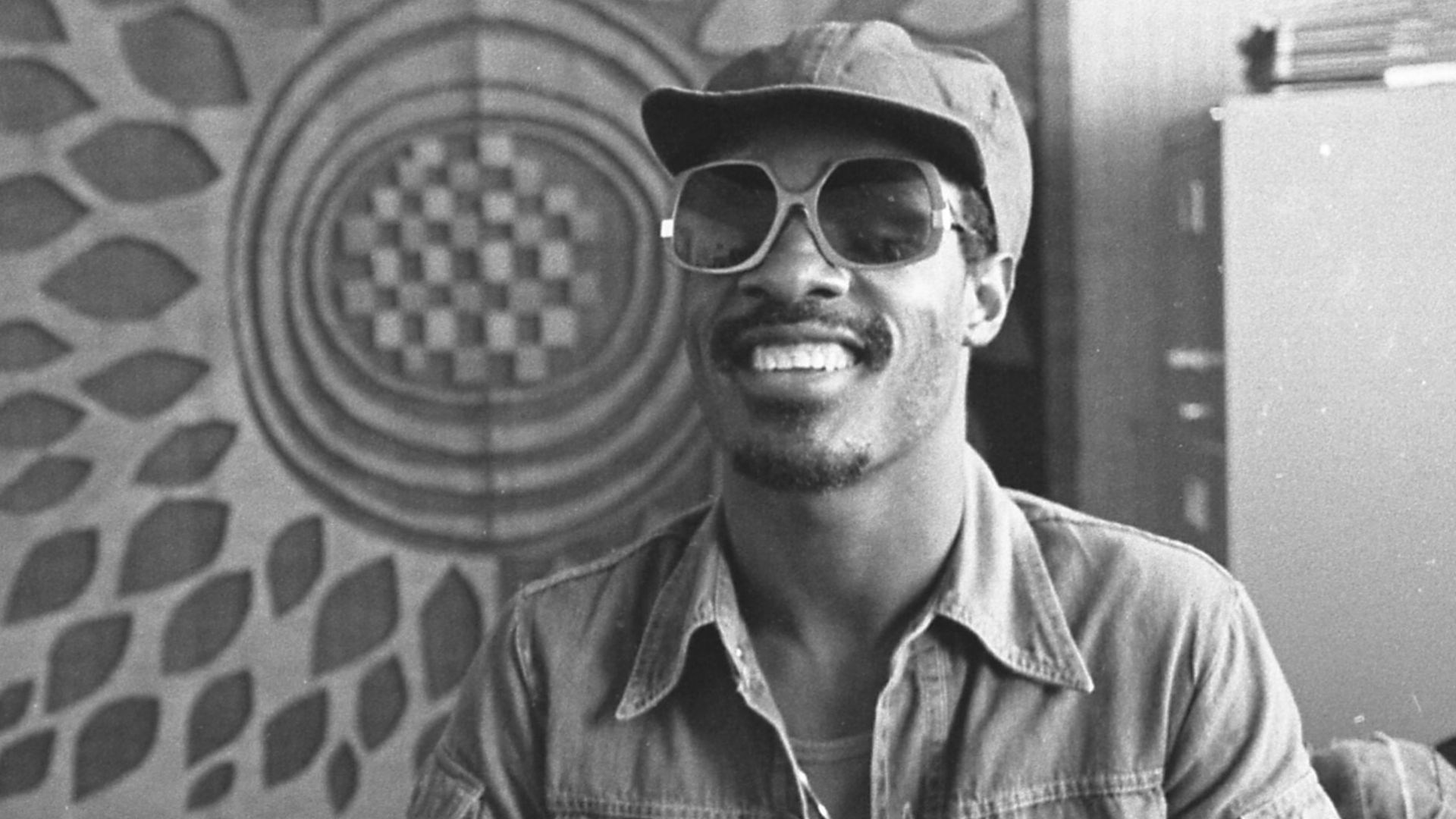 Musician Stevie Wonder with music executive Ewart Abner in Los Angeles, Calif.,