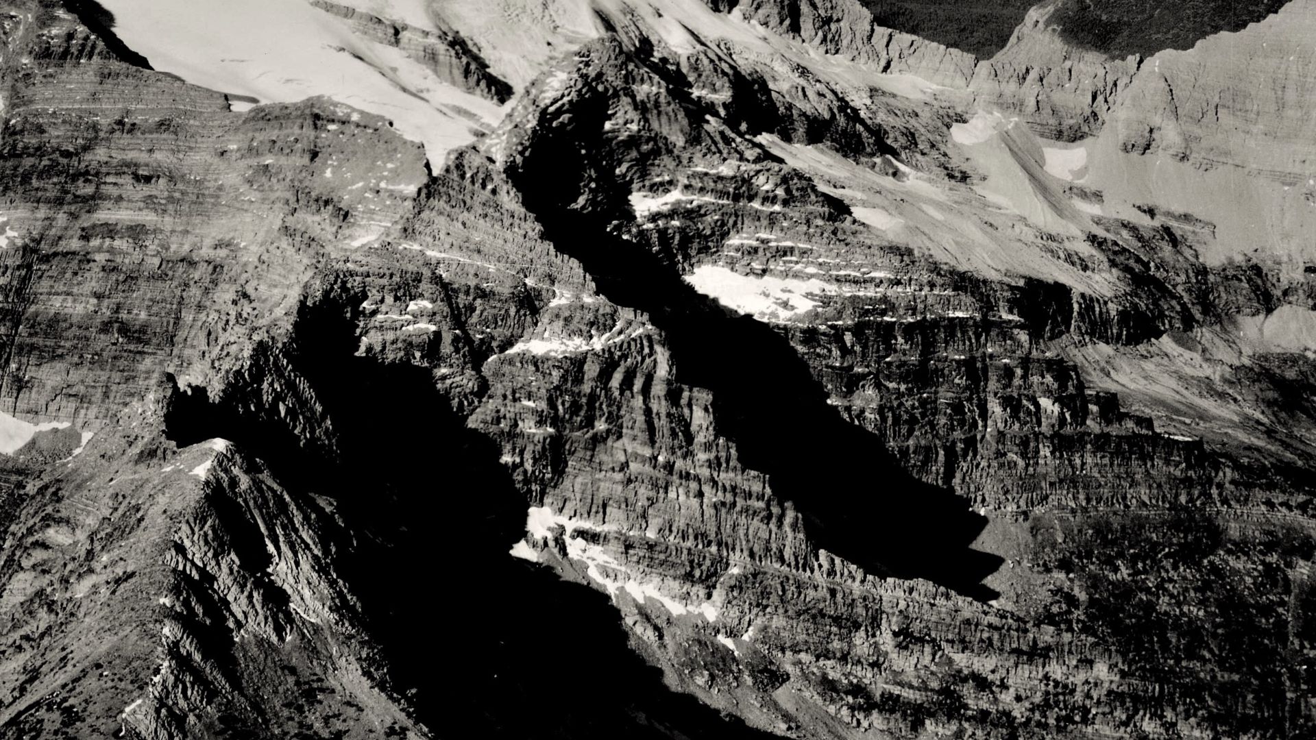 Aerial view of Walton Mountain, south aspect. Glacier National Park, Montana. Circa 1925.