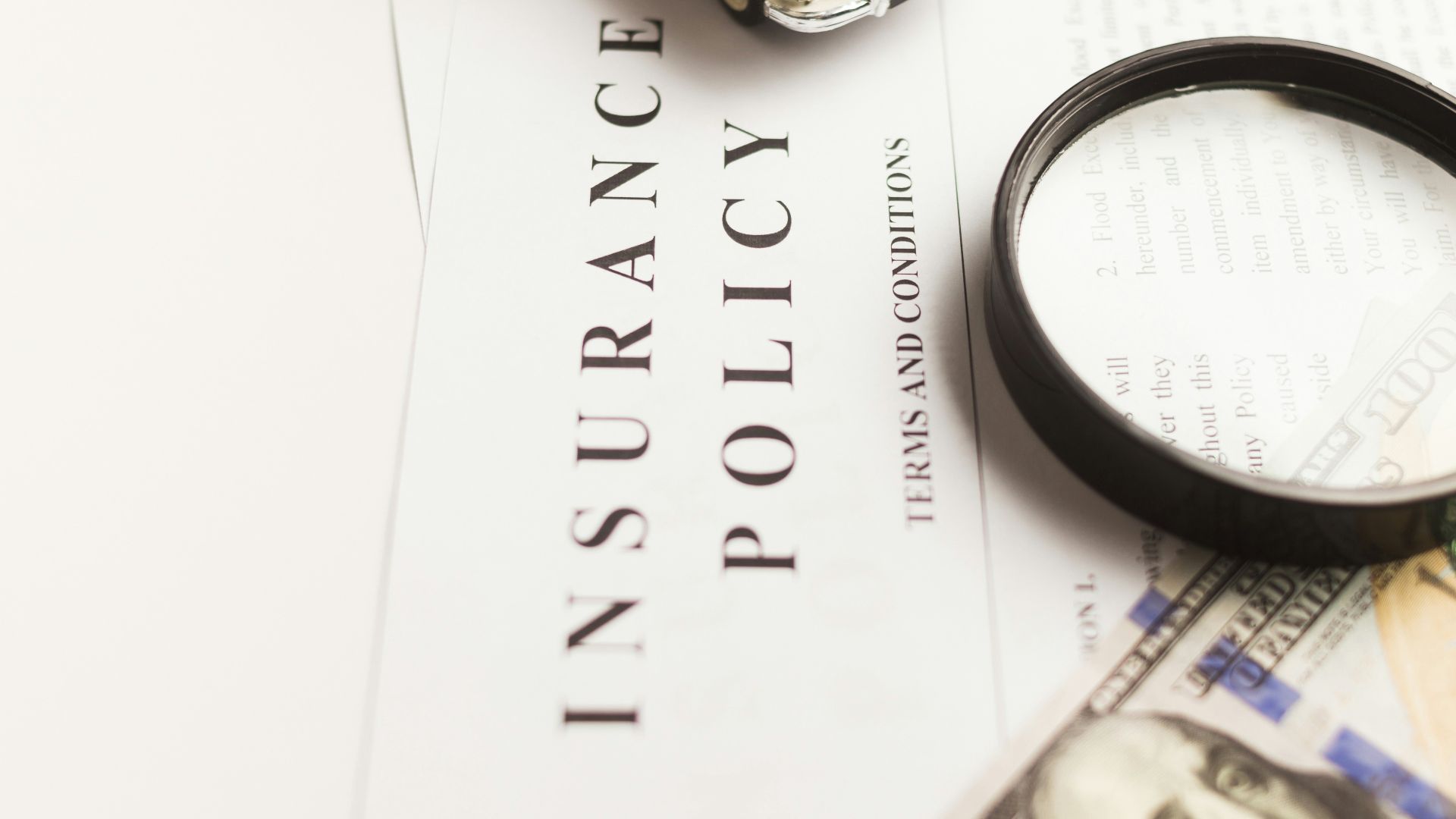 a magnifying glass sitting on top of a piece of paper