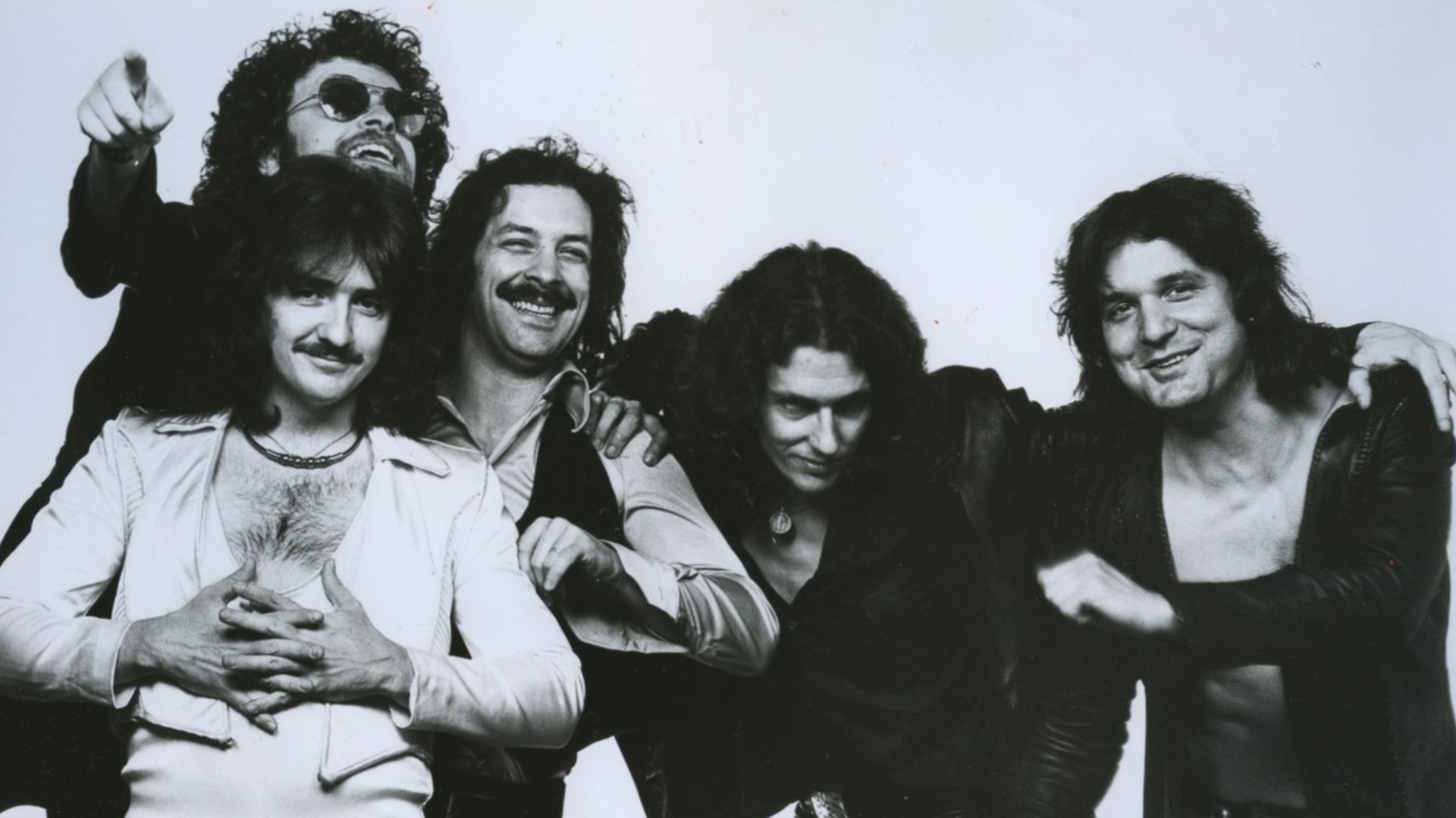 Publicity photo of the band Blue Öyster Cult issued by Columbia Records in 1977 of the lineup that lasted from 1971 to 1981. Left to right: Donald