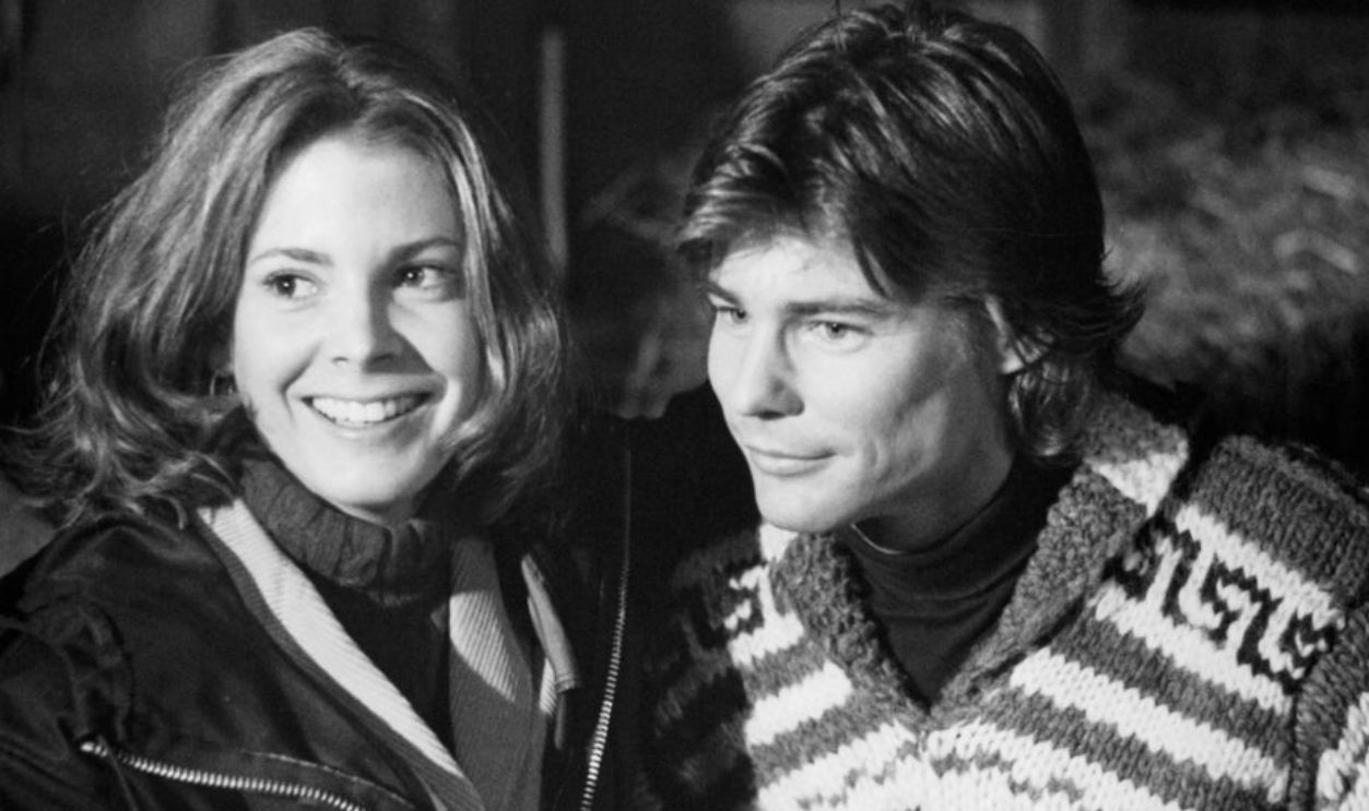 CIRCA 1976: Actress Marilyn Hassett and actor Jan-Michael Vincent on set of the movie 