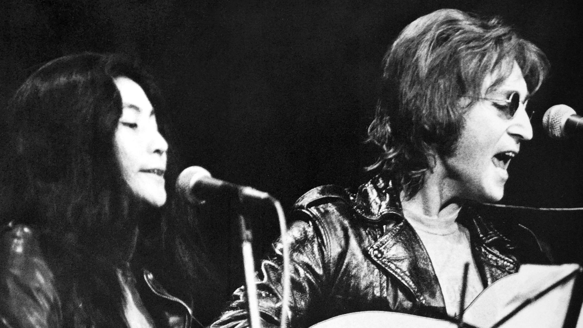 Yoko Ono and John Lennon at John Sinclair Freedom Rally at Crisler Arena in Ann Arbor, Michigan