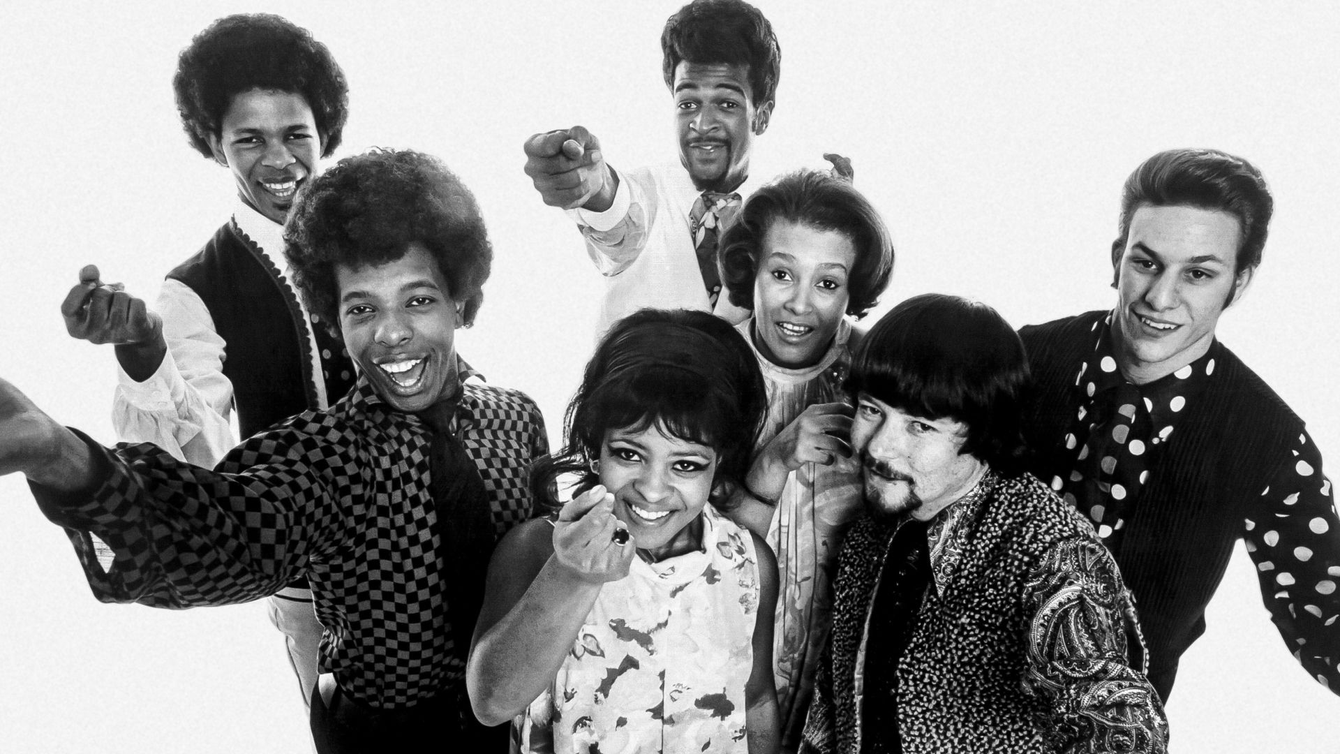 Publicity photo of the American band Sly and the Family Stone in 1968. From left to right: Freddie Stone, Sly Stone, Rose Stone, Larry Graham, Cynthia Robinson, Jerry Martini, Greg Errico.
