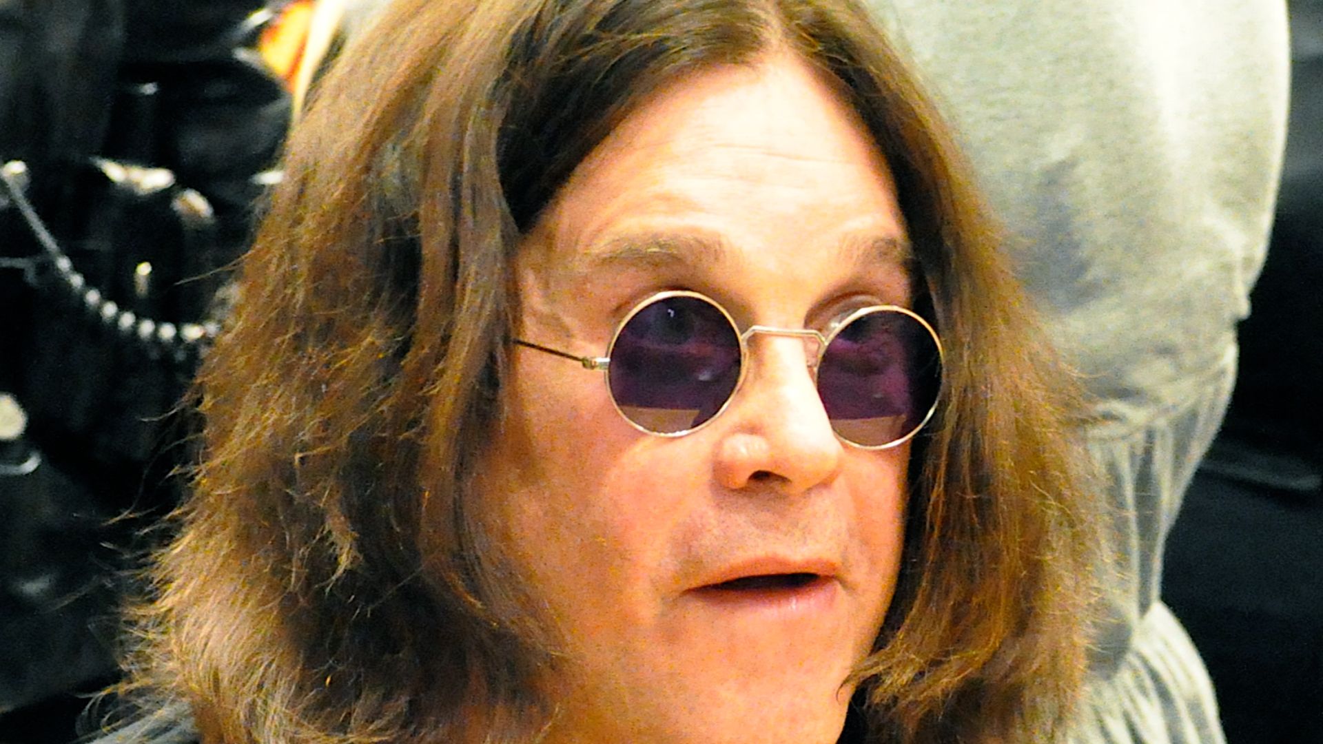 Ozzy Osbourne signs his new autobiography,
