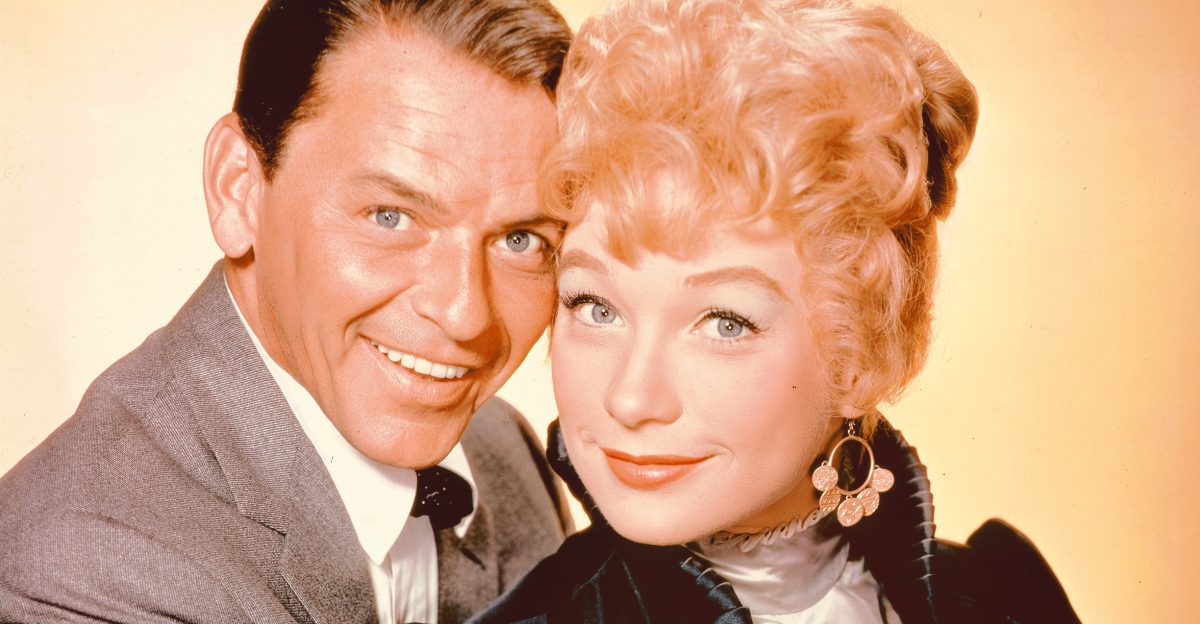 Frank Sinatra and Shirley MacLaine pose for a studio portrait