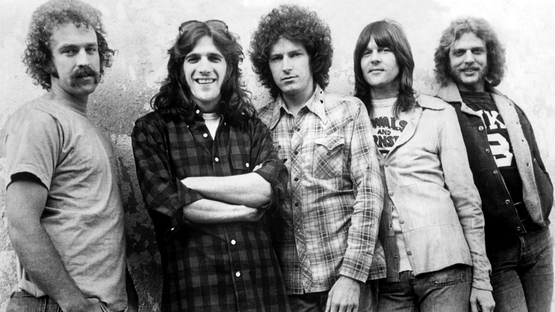 Press photo of the band Eagles by Asylum. Although no date is given, it dates from 1974 to 1975, as those were the only two years the lineup depicted was active. No copyright markings on the photo.