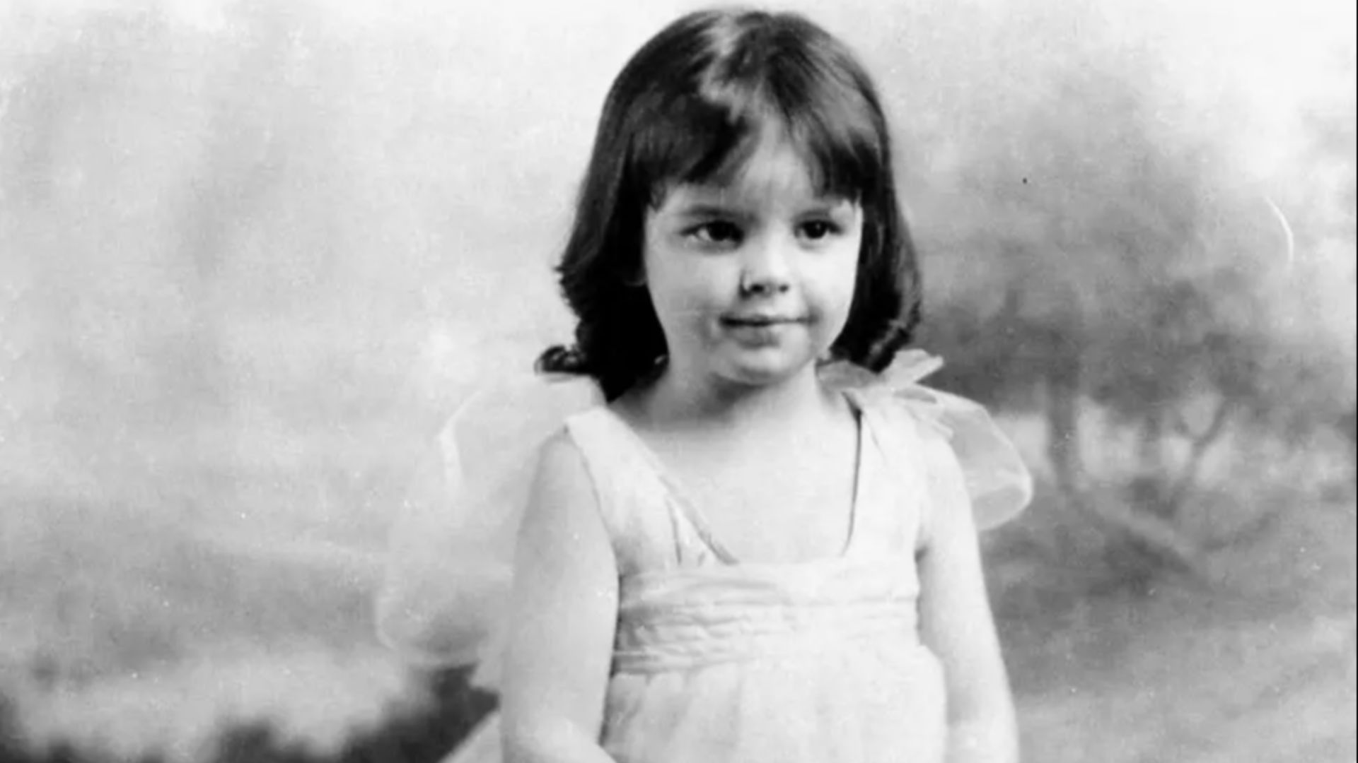 Judy Garland at age two-and-a-half, at her father’s movie house, “The New Grand Theater,” in Grand Rapids, Minnesota, during an evening Christmas performance.