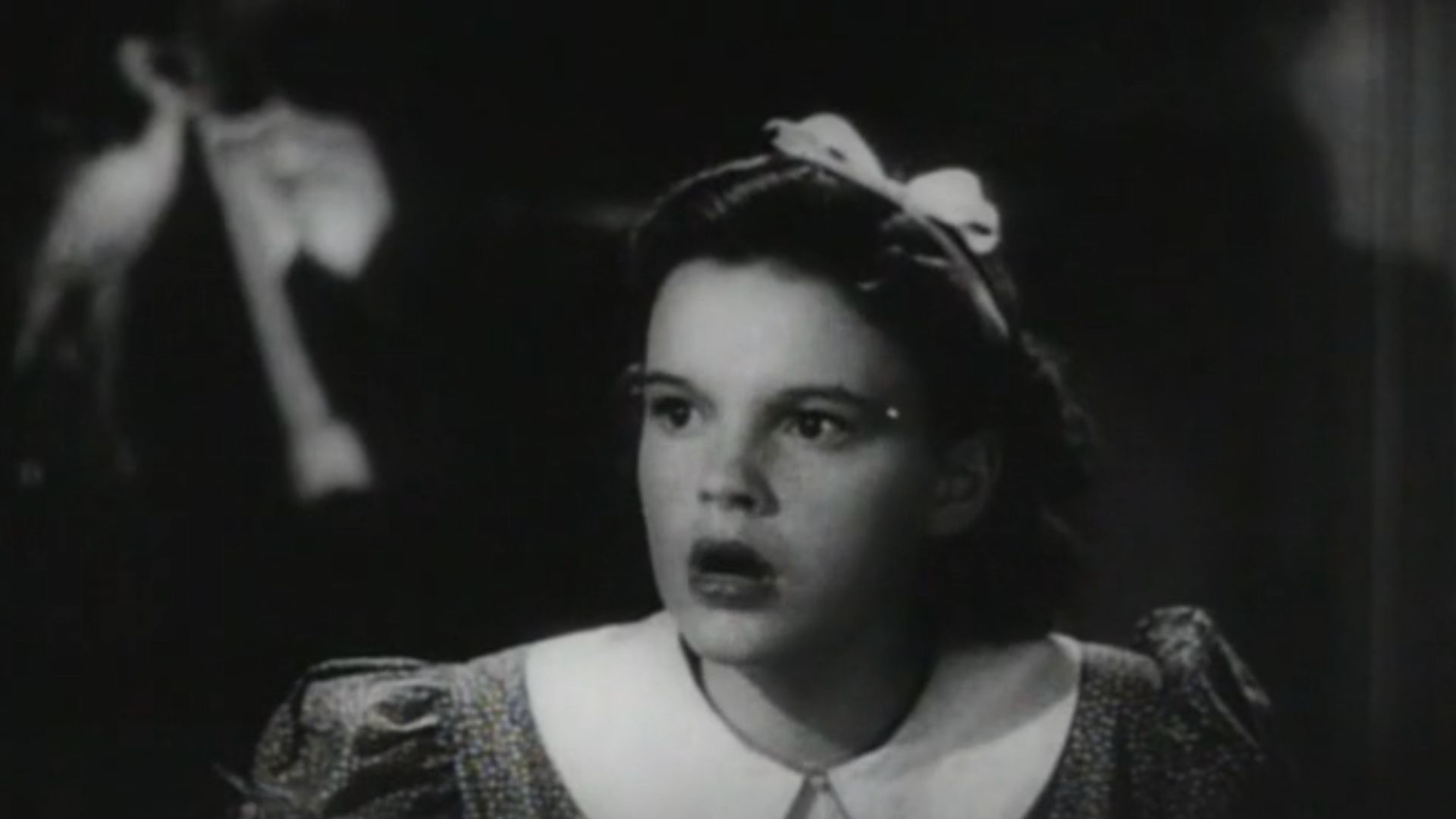 A screenshot of Judy Garland in the Thoroughbreds Don't Cry trailer (1937).