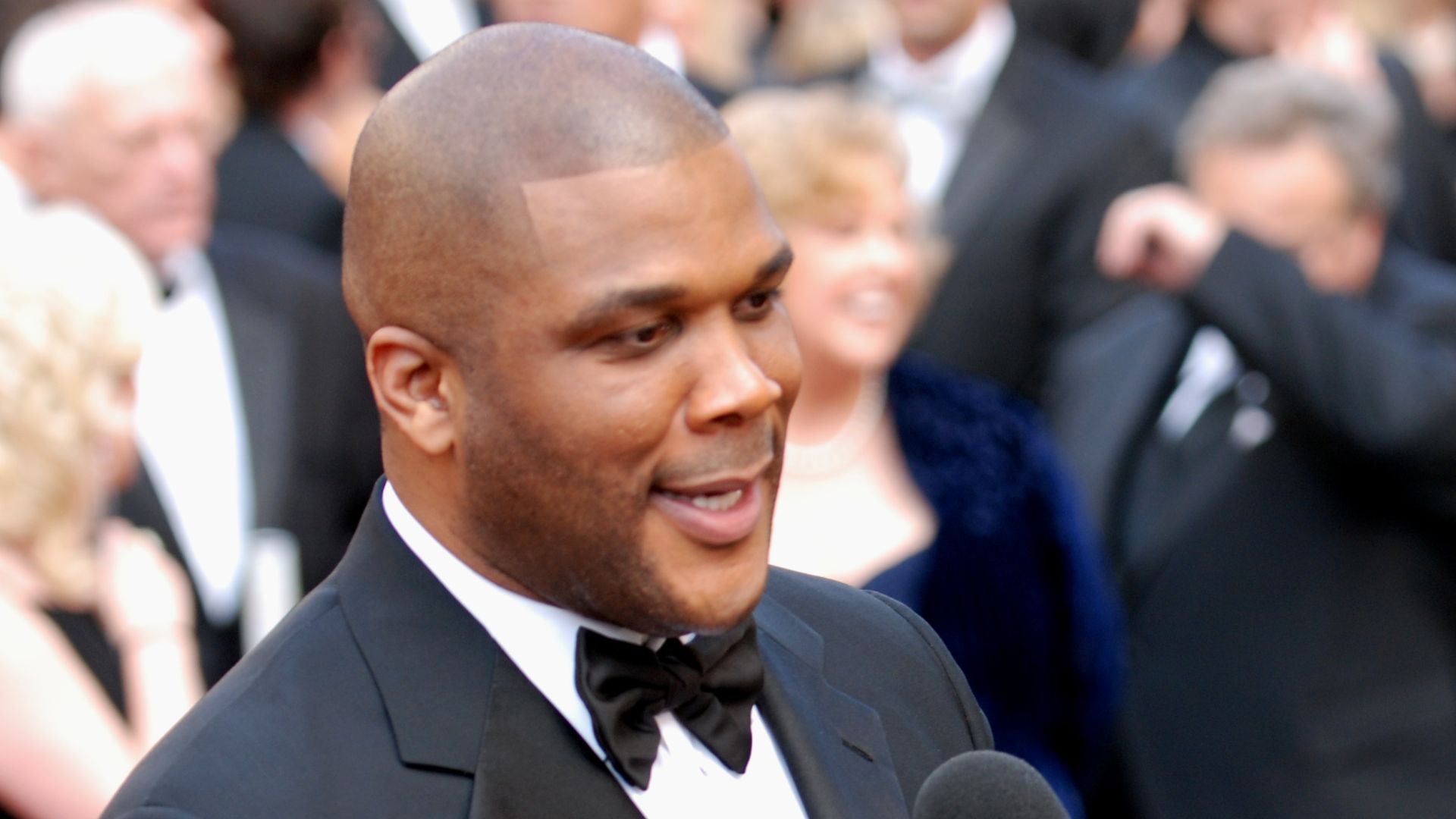 Tyler Perry mixes it up with the media on the red carpet at the 82nd Academy Awards.