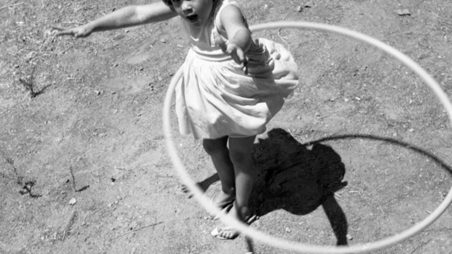 Girl twirling a Hula hoop, 1958
Other information

Photo by George Garrigues.