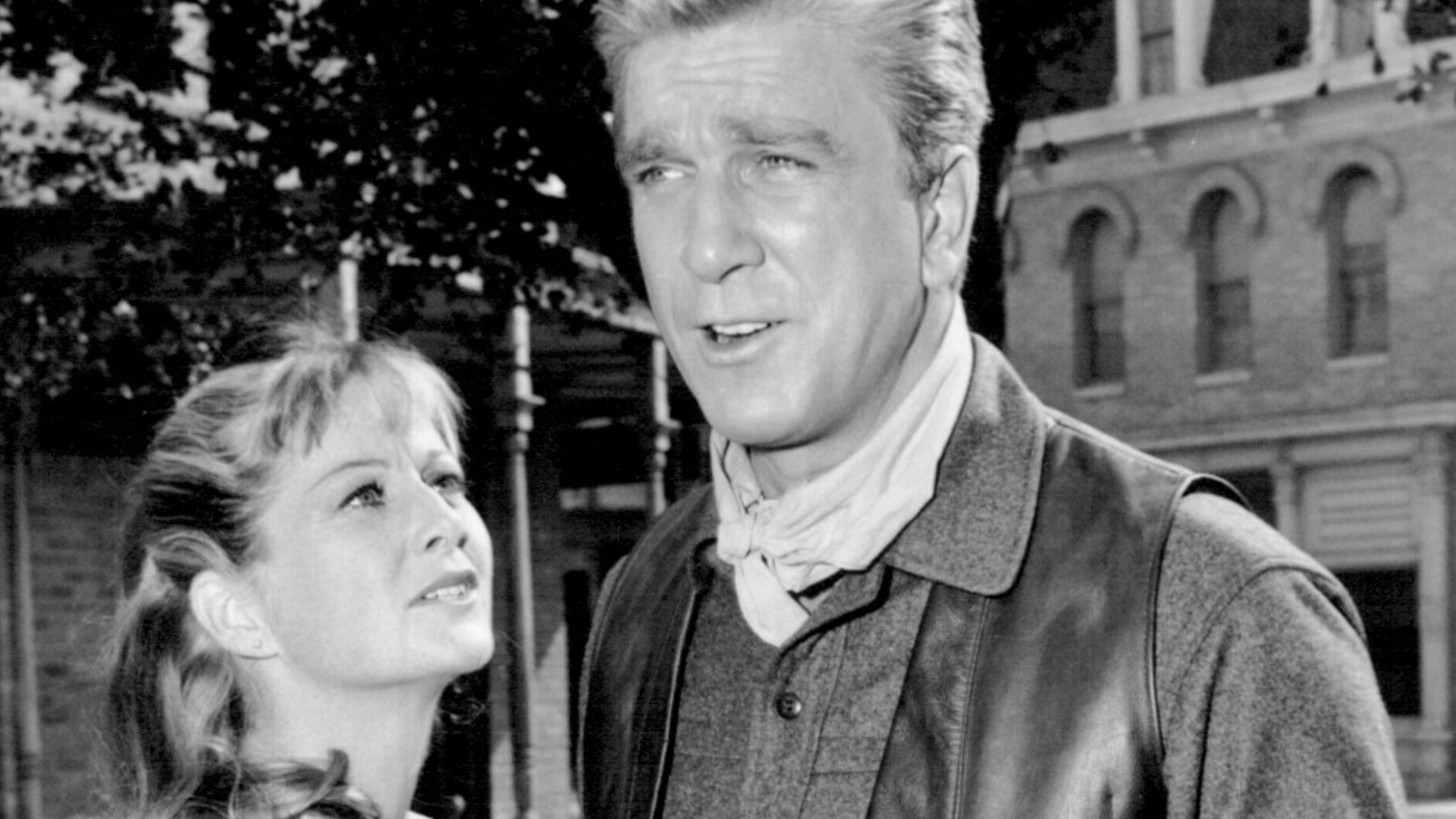 Photo of Leslie Nielsen and Nancy Malone as guest stars on Bonanza.