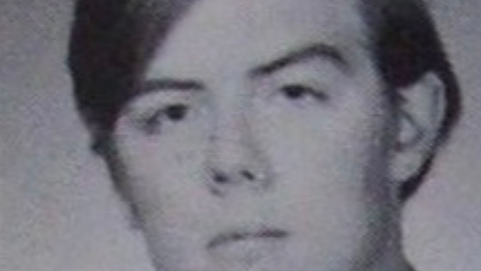 Photo of John Hughes as a junior in high school.