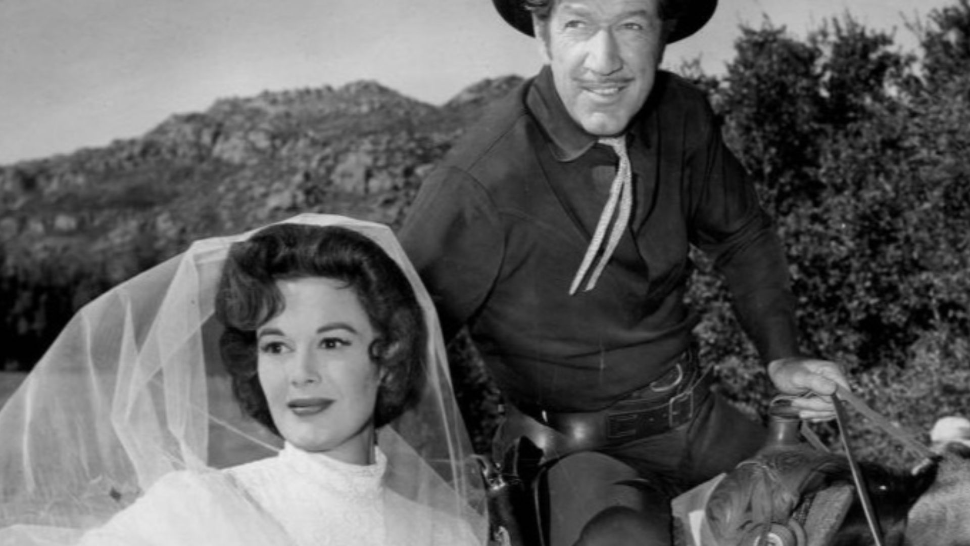 Photo of Richard Boone as Paladin and guest star Patricia Medina from the television program Have Gun, Will Travel.