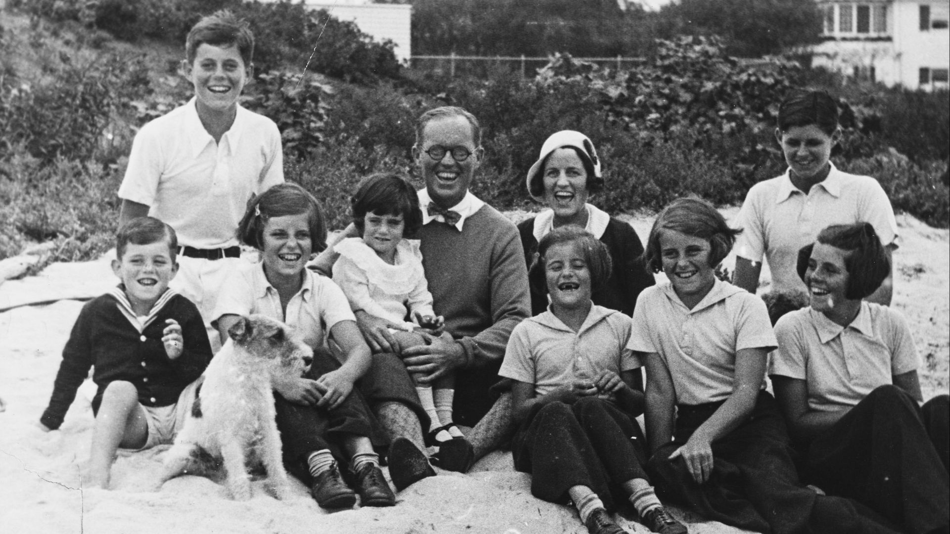The Kennedy Family at Hyannis Port, 04 September 1931. L-R: Robert F. Kennedy, John F. Kennedy, Eunice Kennedy, Jean Kennedy (on lap of) Joseph P. Kennedy Sr., Rose Fitzgerald Kennedy (who was pregnant with Edward