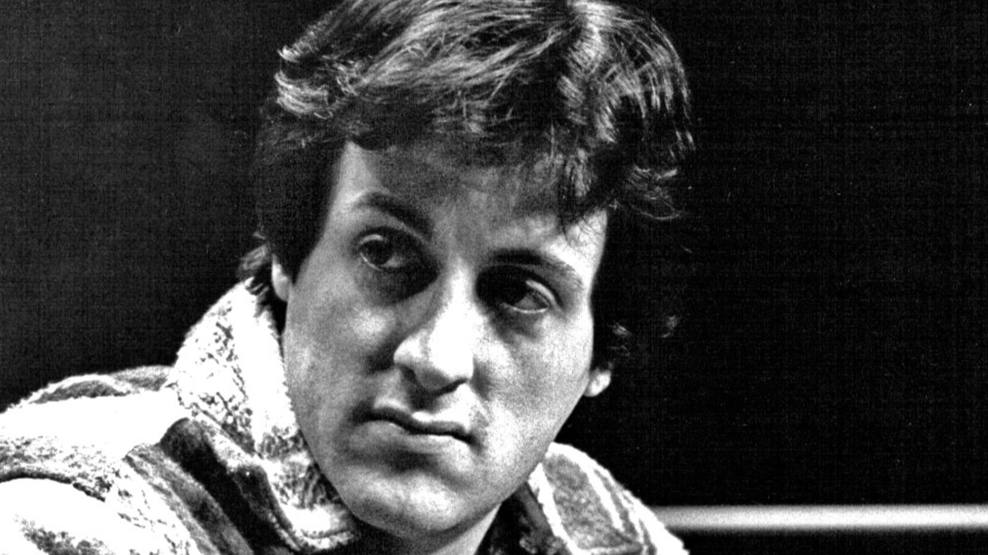 Photo of Sylvester Stallone at the Ken Norton - Duane Bobick boxing match in 1977.