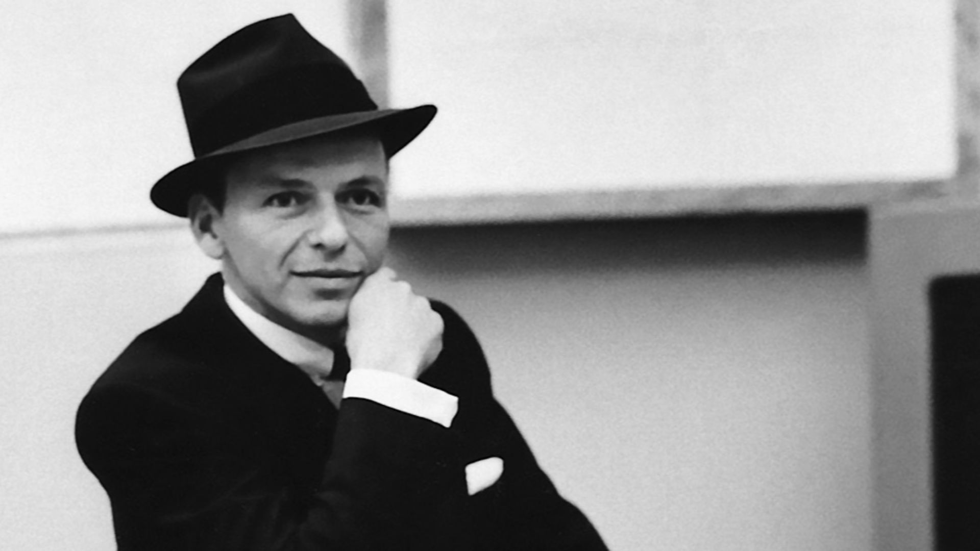 Portrait of Frank Sinatra in the recording studio, October 1957. Capitol Records released the publicity photo to the press to promote Sinatra's appearance in the film Pal Joey, which premiered later that month, and an unnamed upcoming album on Capitol, presumably Come Fly with Me (recorded that month and released January 1958). According to a blurb attached to the photo's backside, Sinatra