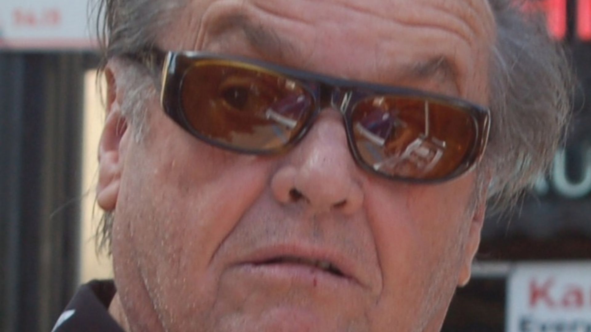 Jack Nicholson signing autographs at a ceremony for Dennis Hopper to receive a star on the Hollywood Walk of Fame.