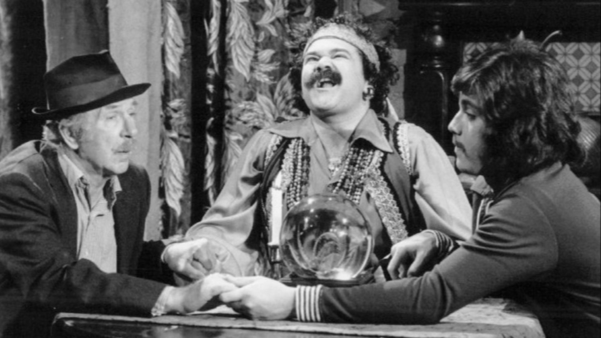 Photo of Jack Albertson, Avery Schreiber and Freddie Prinze from the television program Chico and the Man.  Schreiber plays a very unsuccessful fortune teller Ed and Chico are trying to help out.