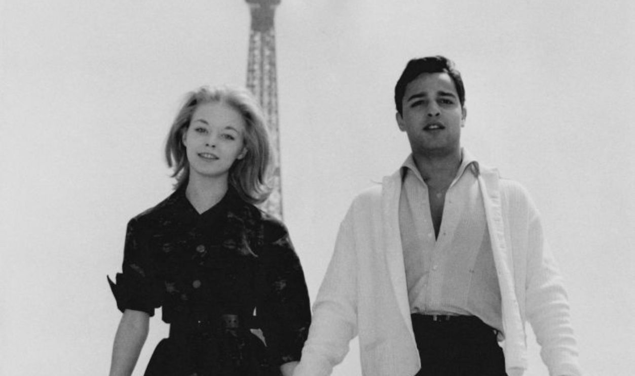 English actress Jill Haworth (1945 - 2011) and American actor Sal Mineo (1939 - 1976) at the Trocadéro, Paris, 12th May 1961. Behind them, across the Seine, is the Eiffel Tower. The actors have recently worked together on Otto Preminger's 'Exodus'.