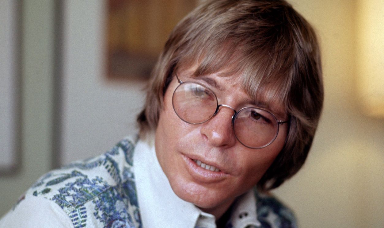 John Denver John Denver poses for a portrait in his hotel room in 1979 in Amsterdam, Netherlands. 