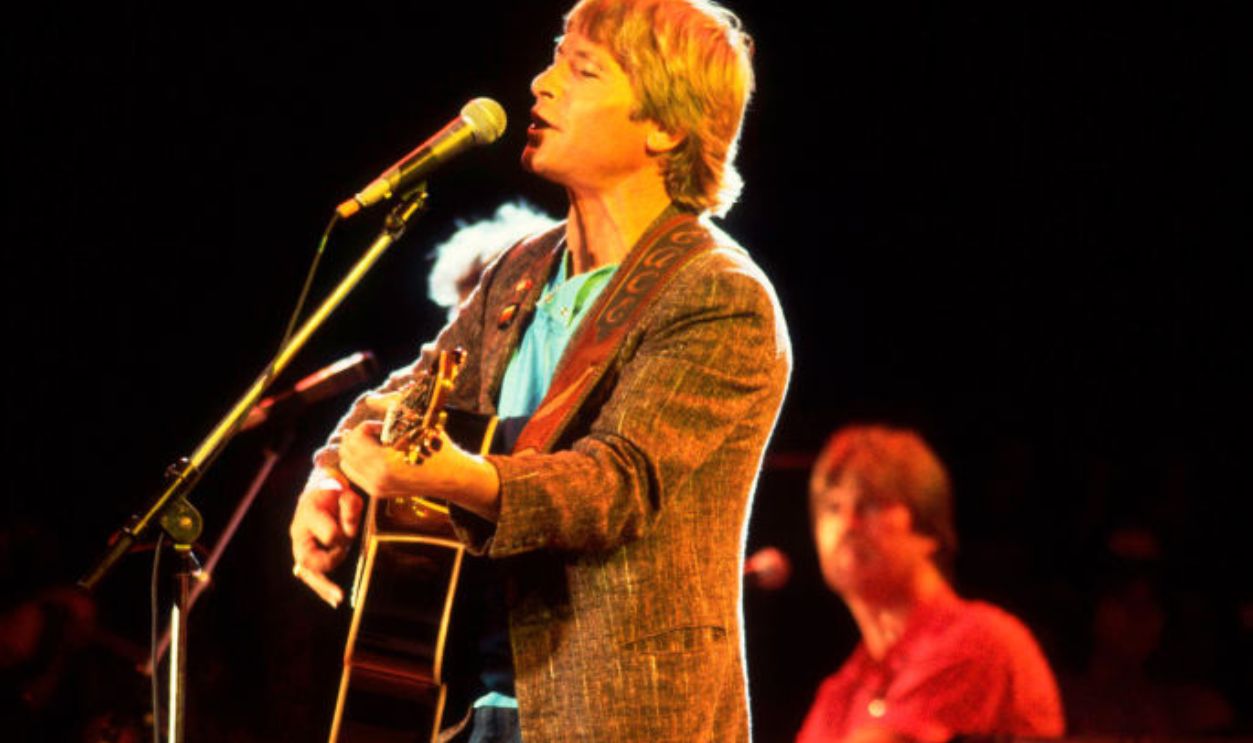 John Denver On Stage American musician John Denver (1943 - 1997) performs on stage during the first Farm Aid concert at Memorial Stadium, Champaign, Illinois, September 22, 1985.