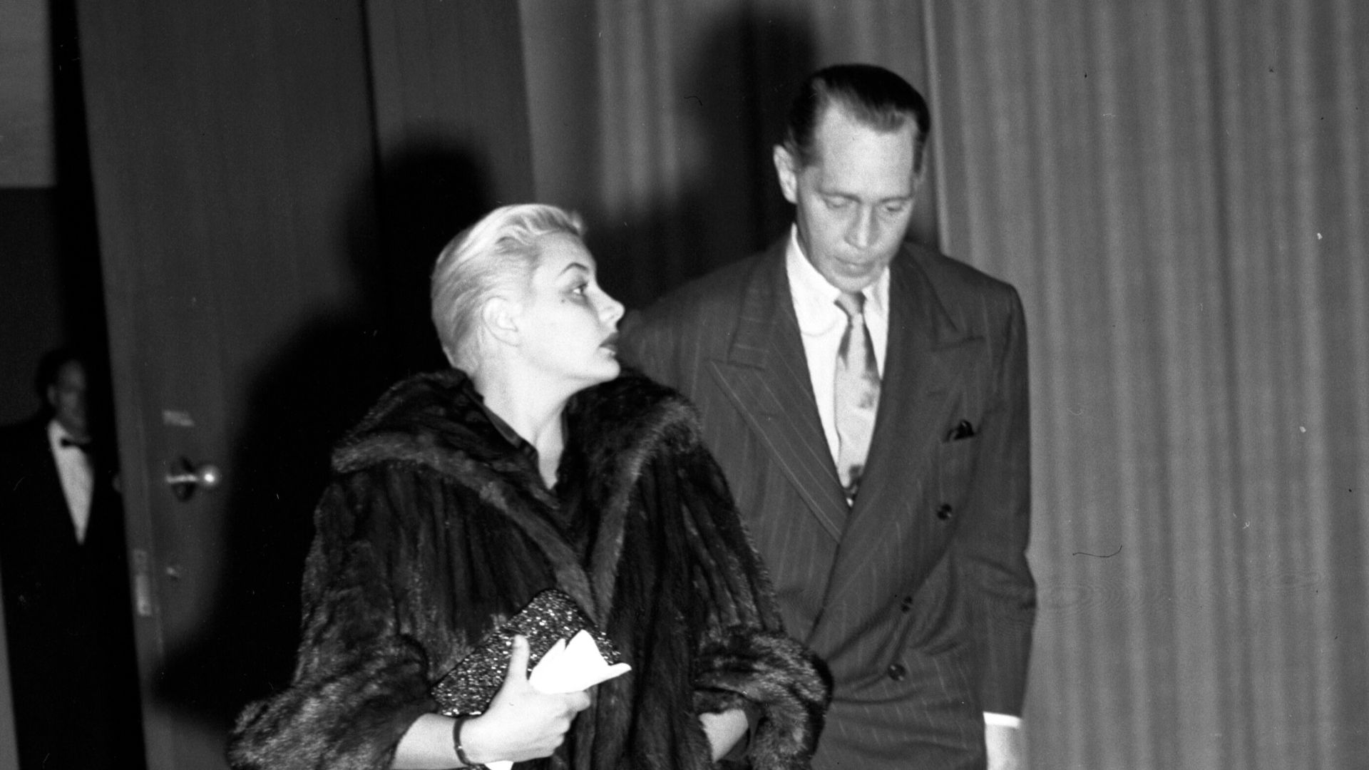 Barbara Payton and Franchot Tone leaving Romanoff's Restaurant in Beverly Hills, California