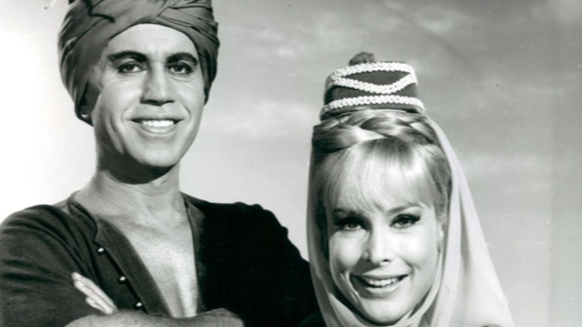 Publicity photo from I Dream of Jeannie. Pictured are the Blue Djinn (Michael Ansara) and Jeannie (Barbara Eden).