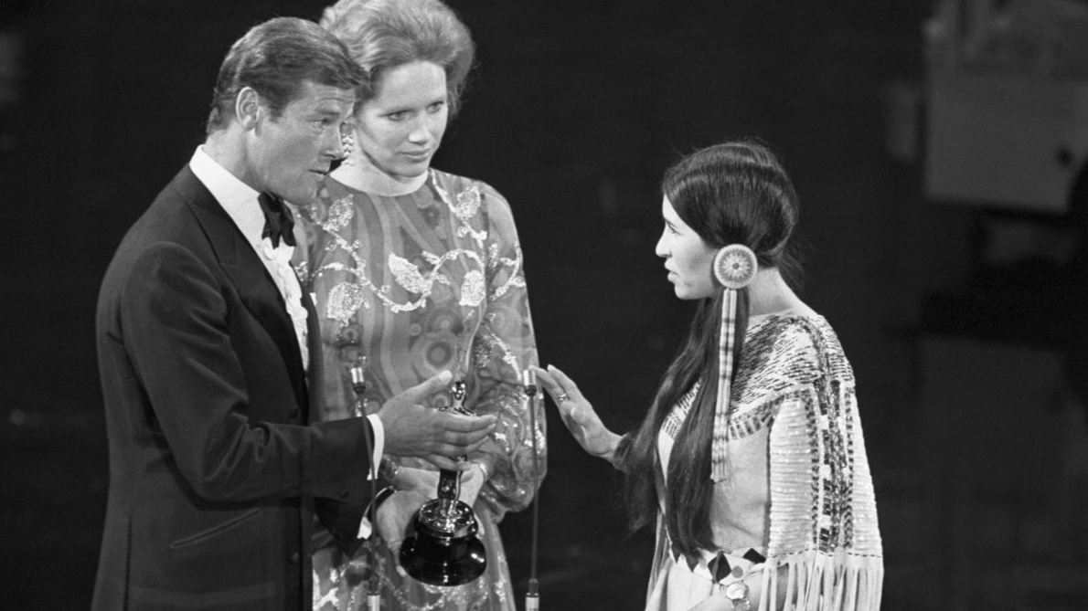 Sacheen Littlefeather Refuses Marlon Brando's Academy Award At the 1973 Academy Awards, Sacheen Littlefeather (born Marie Louise Cruz, 1946 - 2022) refuses the Academy Award for Best Actor on behalf of Marlon Brando who won for his role in The Godfather. She carries a letter from Brando in which he explains he refused the award in protest of American treatment of the Native Americans.