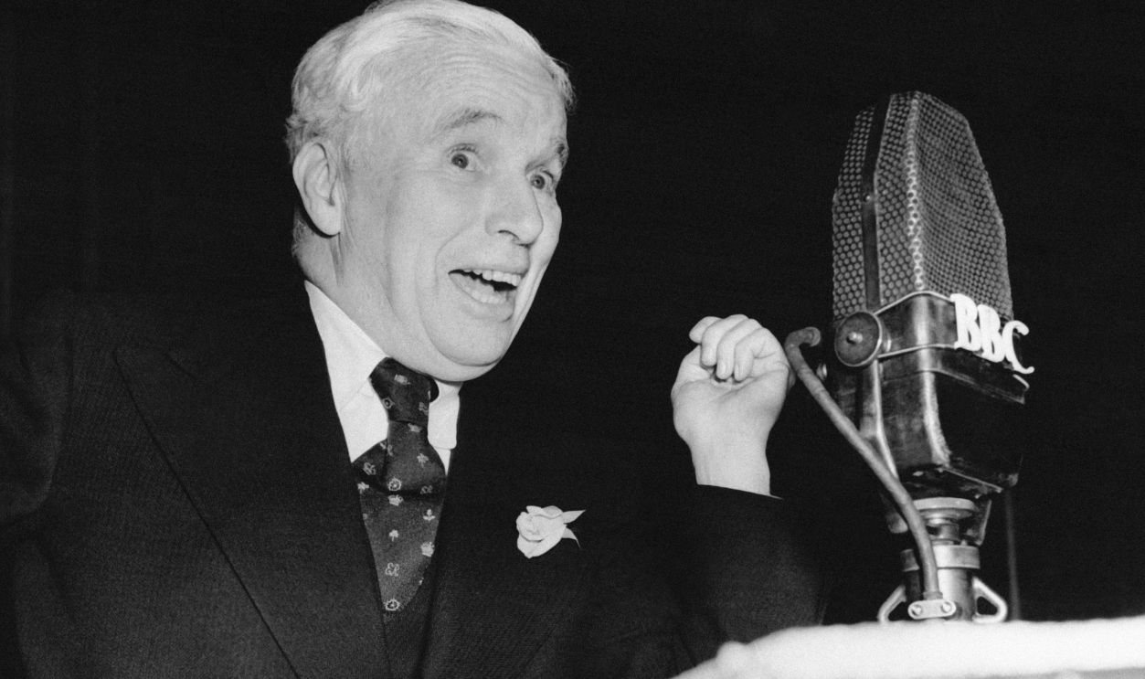 Charlie Chaplin on a radio broadcast LONDON, UNITED KINGDOM OCTOBER 16: Charlie Chaplin answering a question during a BBC radio broadcast in London, United Kingdom, on October 16, 1952.