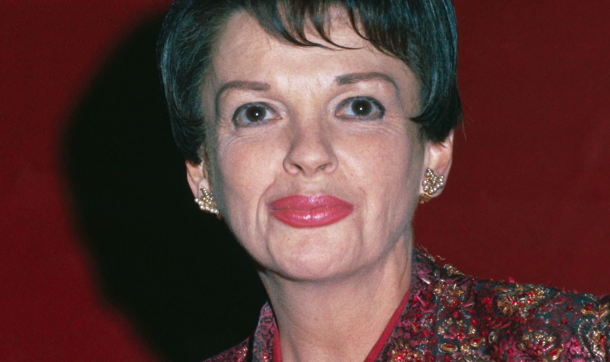 Judy Garland in Close-Up Photo (Original Caption) Here is a close up of Judy Garland, on July 25th. Miss Garland is scheduled to open at the Palace Theatre, here on July 31st, for a limited singing engagement.