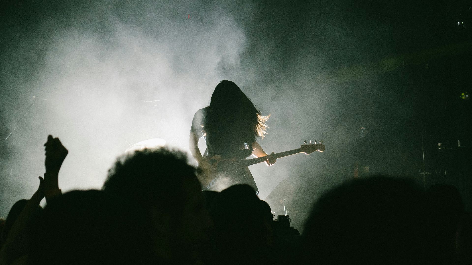 person playing electric guitar