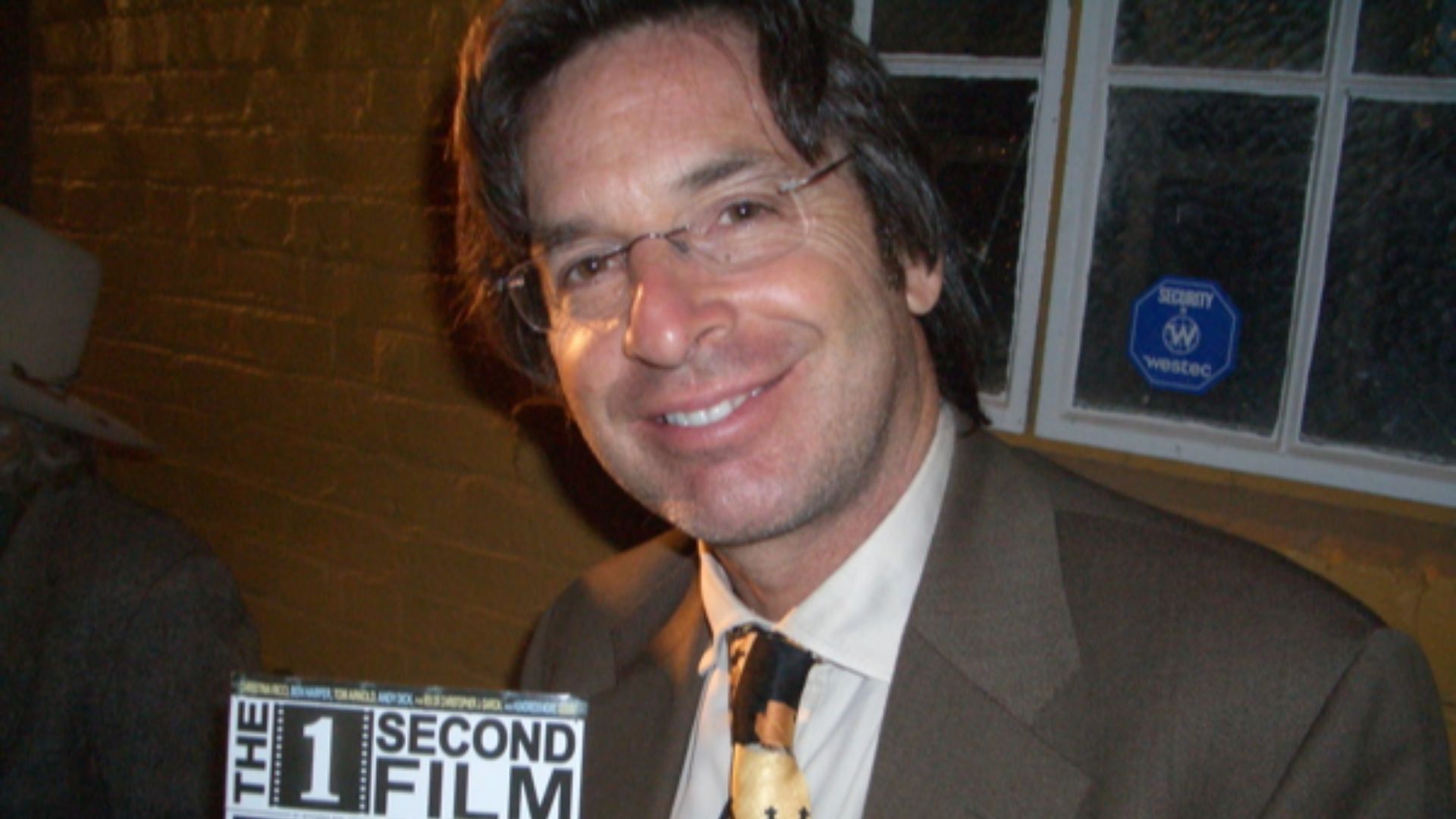 Robert Carradine holding a producer credit for The 1 Second Film at the Mill Valley Film Festival