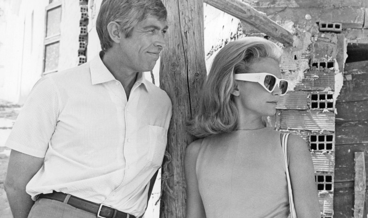 James Coburn And Lee Remick In 'Hard Contract' James Coburn and Lee Remick standing together outside in a scene from the film 'Hard Contract', 1969.
