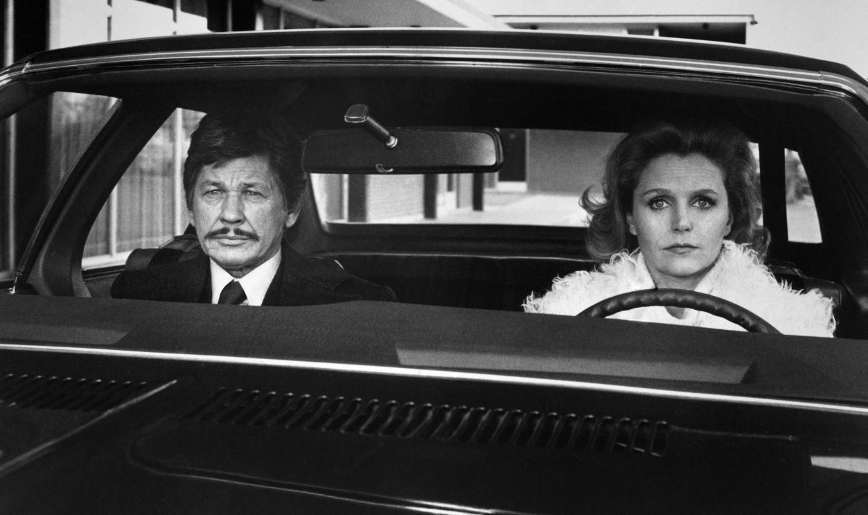 'Telefon' Publicity Still American actor Charles Bronson in the front passenger seat as American actress Lee Remick drives in a publicity still for 'Telefon,' 1977. Directed by Don Siegel, the spy thriller starred Bronson as Major Grigori Borzov, and Remick as Barbara.