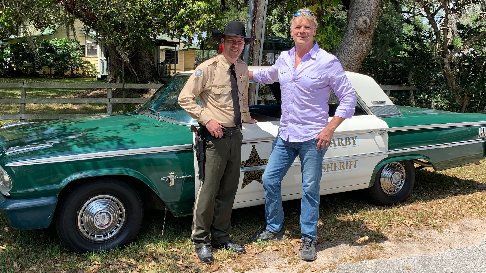 Andy Cobb as the Sheriff with John Schneider on the set of Honky Tonk Ranch