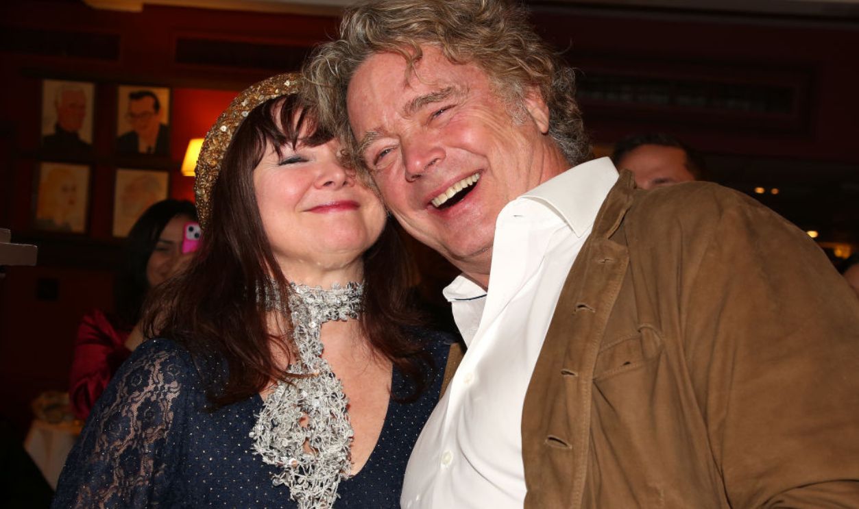 NEW YORK, NEW YORK - JANUARY 15: Dee Dee Sorvino and husband John Schneider pose during a celebration honoring Schneider with a caricature for his work in the long running play 