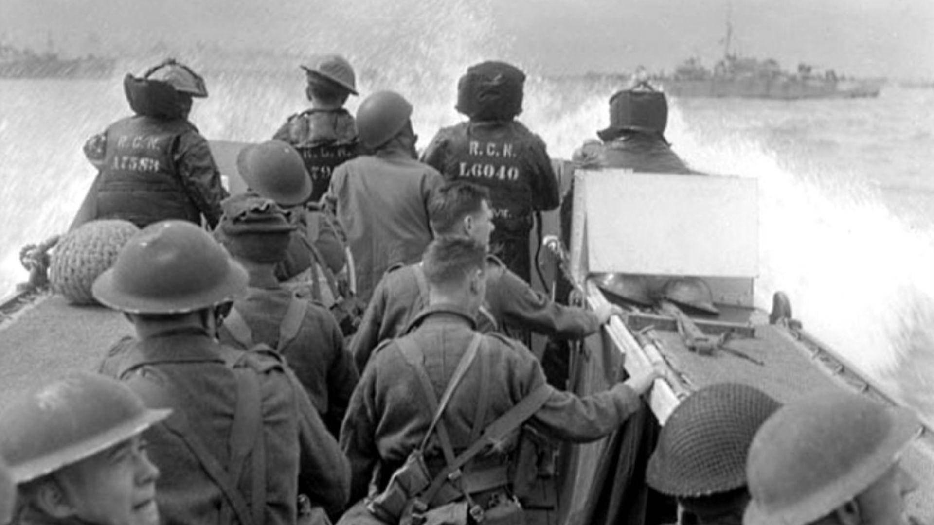 Infantrymen in a Landing Craft Assault (LCA) going ashore from H.M.C.S. PRINCE HENRY off the Normandy beachhead, France, 6 June 1944