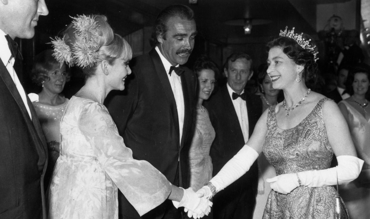 Scottish film star Sean Connery and his wife Diane Cilento welcome the Queen to the premiere of Sean's latest Bond film, 'You Only Live Twice', at the Odeon, Leicester Square, London. 