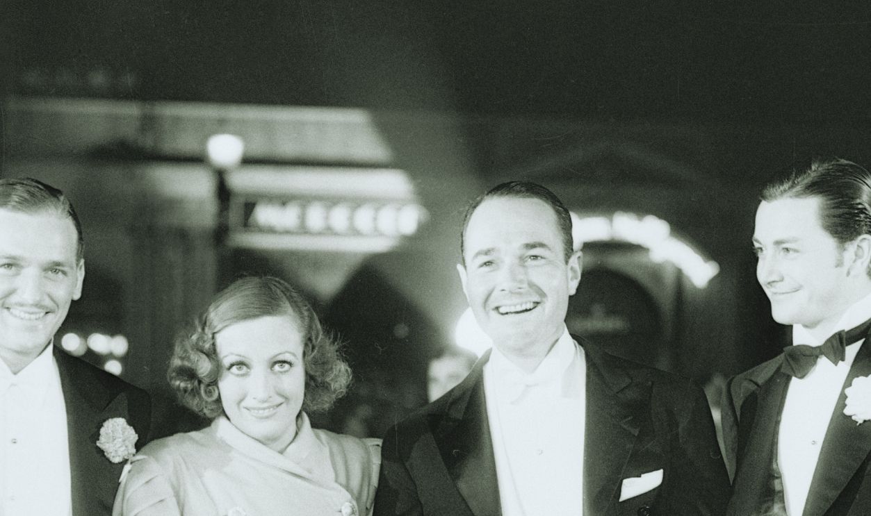  Douglas Fairbanks Jr., his wife, Joan Crawford, William Haines and Robert Young (left to right), are seen here as they arrived for the premiere of Rain in Grauman's Chinese Theater in Hollywood, California.