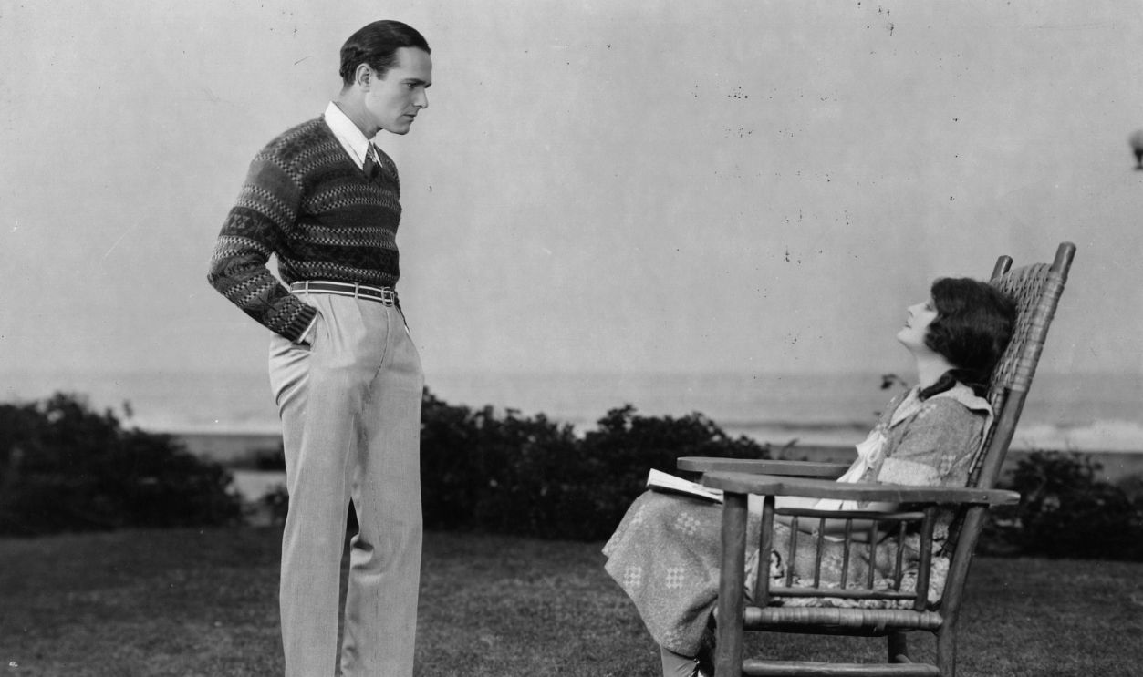 Eleanor Boardman (1898 - 1991), American actress and wife of King Vidor talks to William Haines (1900 - 1973) in a scene from the film 'Wife Of The Centaur', directed by King Vidor for MGM. 