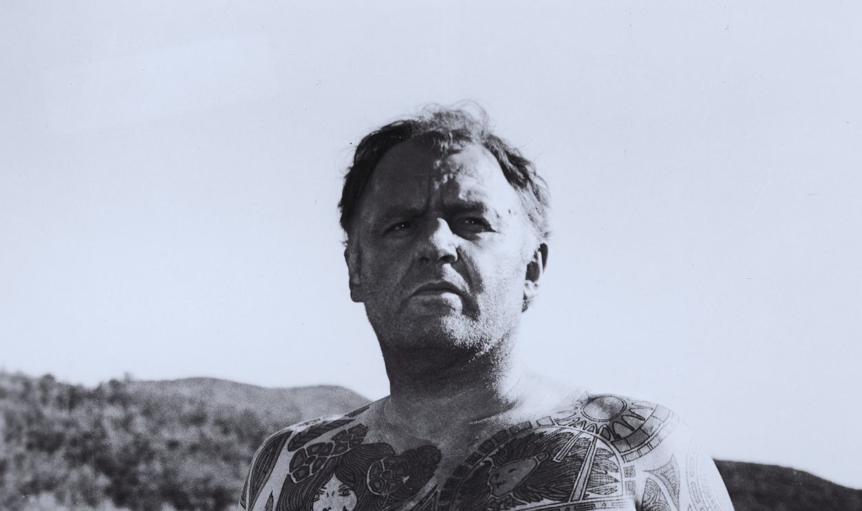 Gettyimages - 83816902, The Illustrated Man American actor Rod Steiger (1925 - 2002), barechested and covered in tattoos, standing by the edge of a river in a still from director Jack Smight's film, 'The Illustrated Man', 1969.