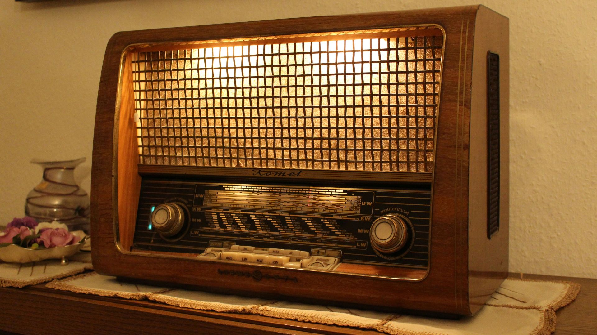 brown and black radio on brown wooden table