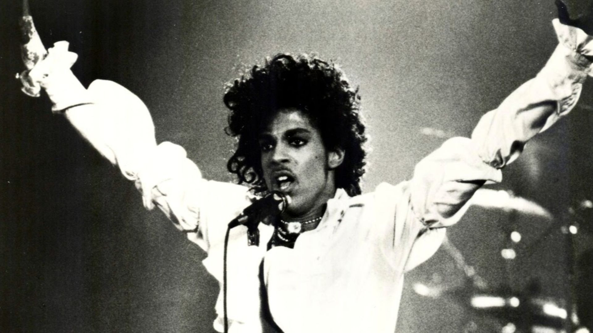 The American musician Prince in a press photo dated to 1984. No copyright markings on the photo and no registration for this photo could be found in the US Copyright Registry.