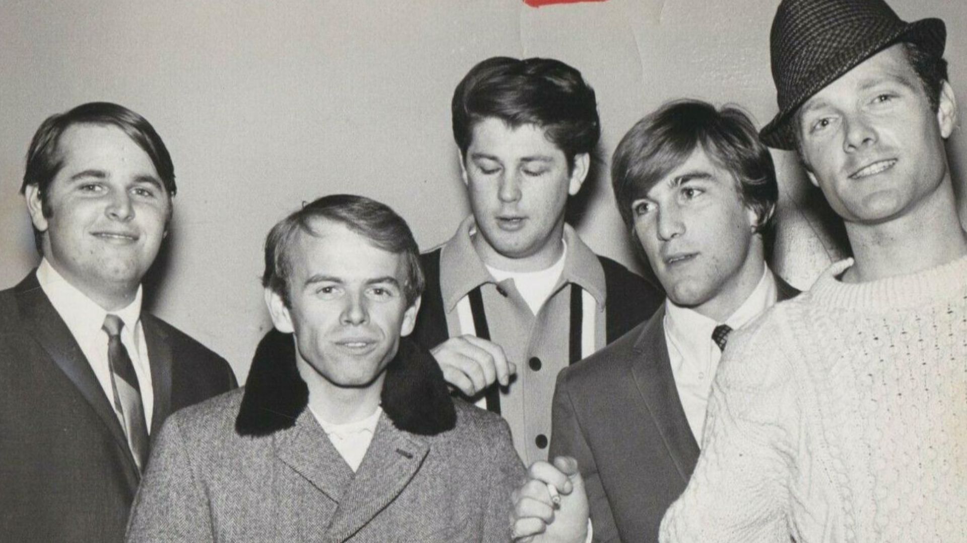 The Beach Boys posing backstage at the Philadelphia Convention Hall in 1965