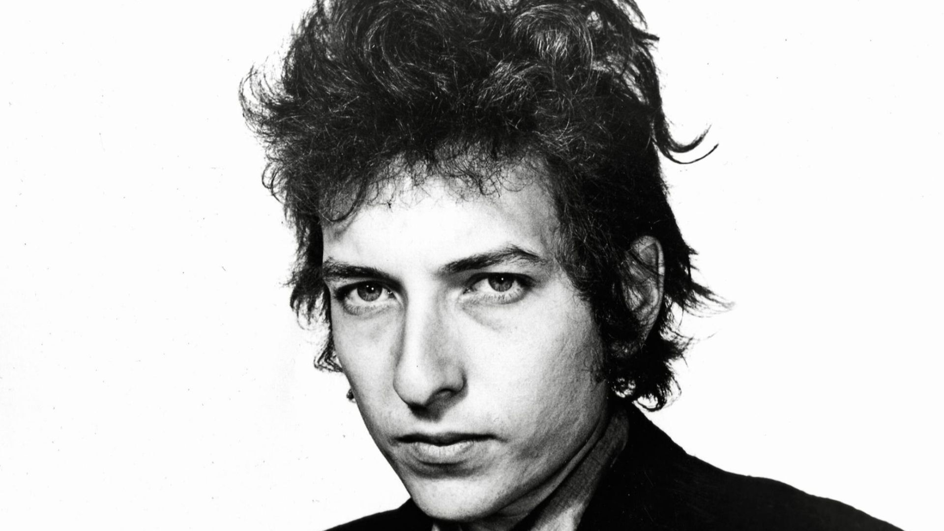 Bob Dylan in a 1965 publicity photo taken by Daniel Kramer. The photo was issued by Albert Grossman Management (ABGM), created by Dylan's manager Albert Grossman.