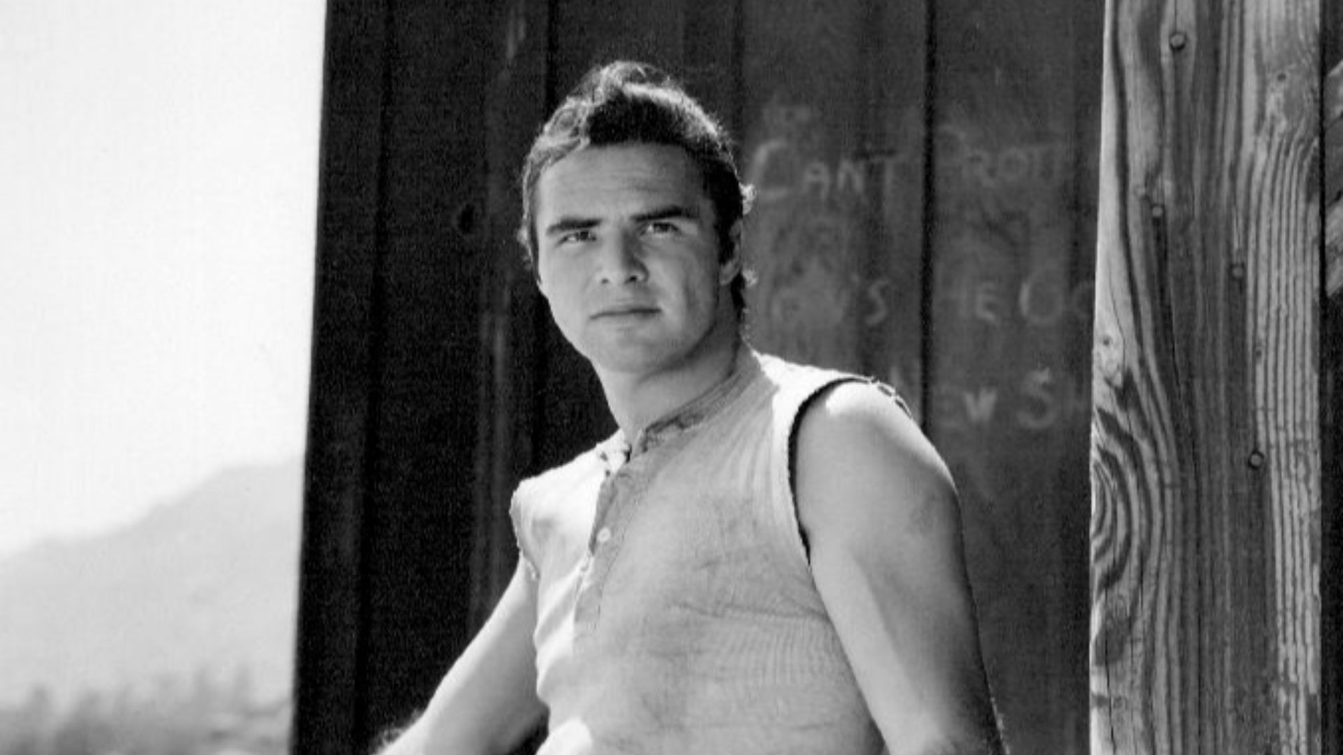 Publicity photo of Burt Reynolds as blacksmith Quint Asper from the television program Gunsmoke.
